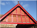 Red terracotta and red timber