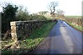 Parapet of bridge on SW side of road approaching Low Woodside