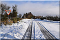 H5559 : Tracks in the snow on Garvaghy Road by Kenneth  Allen