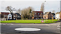 Housing beyond mini-roundabout