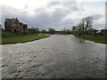 NY5329 : The River Eamont in flood above Castle Bridge, Brougham by Jonathan Thacker