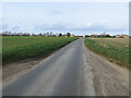 TM1592 : Overwood Lane passing between arable fields by Peter Wood