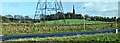 Pylon, motorway and church