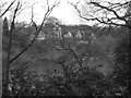 Looking over Old Warke Dam to The Aviary