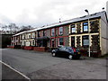 Row of houses at the western end of Dyfodwg Street, Treorchy