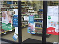 Pharmacy sign "Face mask available" in coronavirus pandemic