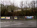 Four banners on railings on the approach to Abergorki Industrial Estate, Treorchy