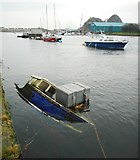 NS3975 : Half-submerged boat by Richard Sutcliffe