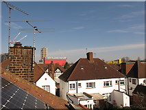 TQ2081 : Rooftop view, North Acton, with aerials and cranes by David Hawgood
