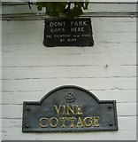 SU8985 : Old Notice on Vine Cottage by Sean Davis