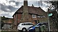 House and public footpath sign in Blackstone