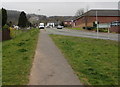 Pavement between grass, Henllys Village Road, Cwmbran