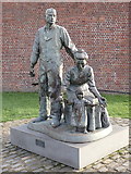SJ3389 : Sculpture "The Emigrants", Liverpool by Rudi Winter