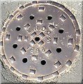 Cast iron manhole cover