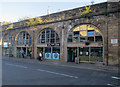 NZ2463 : Businesses in the arches, Westgate Road by Hugh Venables