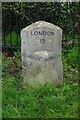 TQ0576 : Milestone on Bath Road, Longford by Ian S