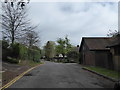 Approaching the junction of Hill Road and Dene Close