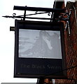 Sign for the Black Swan public house, Wetwang