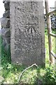 Benchmark on gatepost on south side B6478 near Wigglesworth House