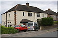 SK3579 : Houses on northwest side of Holmley Lane by Roger Templeman