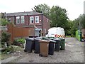 A congregation of wheelie bins