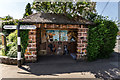 Old Direction Sign and Painted Bus Stop, Denstone