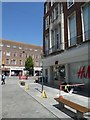 Workers fixing 2 metre lockdown notices, Bedford Square, Exeter