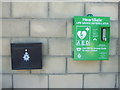 An AED and a police letterbox