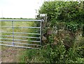 Sandstone gatepost with Ordnance Survey cut benchmark