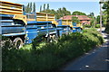 SU7564 : Silage trailers waiting for the next cut by Simon Mortimer