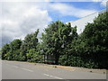 Bus shelter among the warehouses