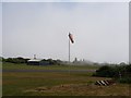 Wind sock and building at LEC airfield