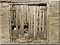 A rickety wooden door