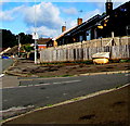 Yellow box and a wooden fence on a Malpas corner, Newport