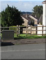 Dark green cabinet and wooden gate, Almond Drive, Malpas, Newport