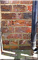 Benchmark on 5/6th bricks above ground on Bullamoor Farm House