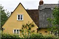 Thorpe Green, Willow Cottage: Thatching and pargetting detail