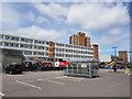 Morrisons car park with government buildings