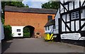 The Crown (3) - entrance to car park, High Street, Claverley, Shrops