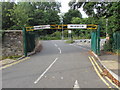 Metal barrier over the entrance to Old Mill Car Park, Pontypool