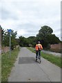 Cyclist pausing on the path on the B1209