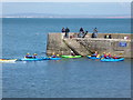 SX9365 : Canoeists at Babbacombe breakwater by Chris Allen
