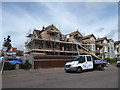 Roofers on a building in Agate Road