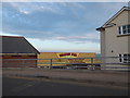 A glimpse of the pier entrance from The Promenade