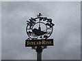 Close up of the village sign at Istead Rise