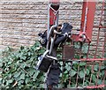 Padlocks and chains on Coach Road M1 underpass gates