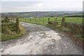 Cattle grid across entrance track to Oakworth Farm from Hob Cote Lane