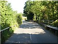 Raised footway crossing drainage ditches, Station Road, Broadclyst