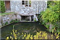 Water passing under former mill