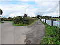 Trac yn gadael heol fach / Track exiting a minor road